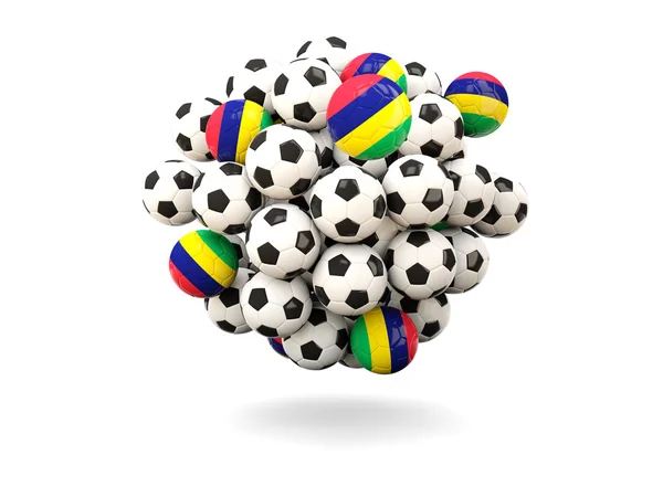 Hög med fotbollar med flagga mauritius — Stockfoto
