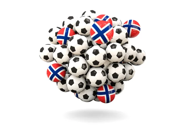 Mucchio di palloni da calcio con bandiera di norway — Foto Stock