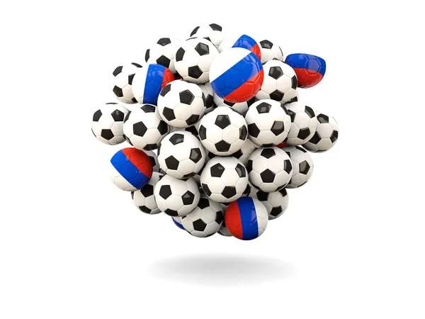 Montón de balones de fútbol con bandera de Rusia — Foto de Stock