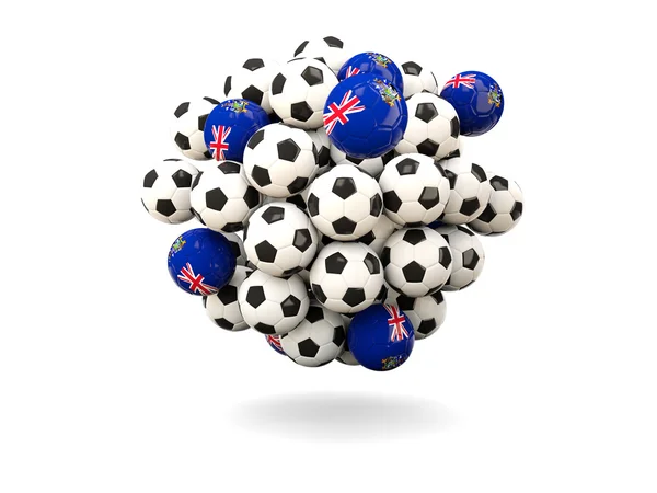 Mucchio di palloni da calcio con bandiera della Georgia meridionale e la sabbia del sud — Foto Stock