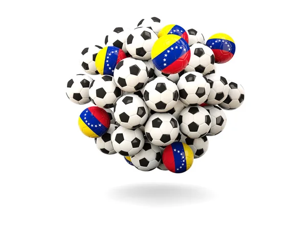 堆的足球与委内瑞拉国旗 — 图库照片