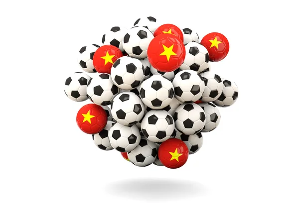 堆的足球与越南国旗 — 图库照片