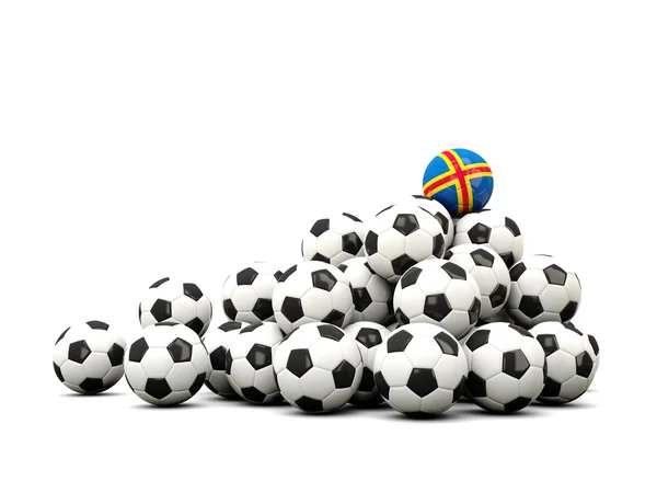 Mucchio di palloni da calcio con bandiera delle isole aland — Foto Stock