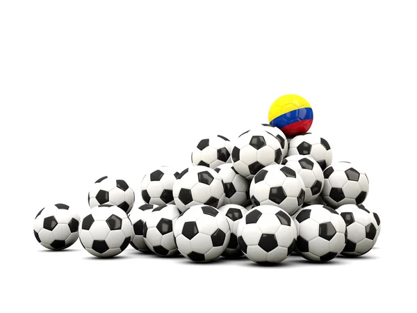 Montón de pelotas de fútbol con bandera de colombia — Foto de Stock