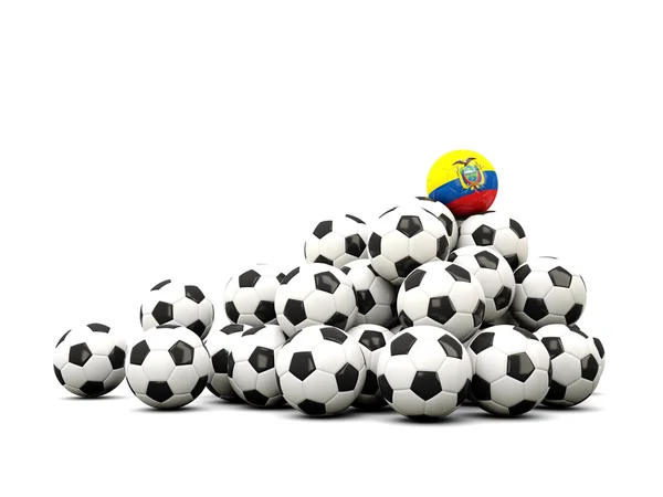 Högen av bollar fotboll med flagga i ecuador — Stockfoto