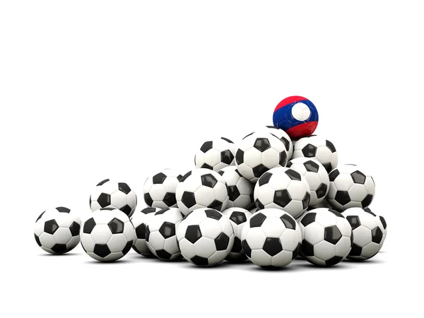 Mucchio di palloni da calcio con bandiera del Laos — Foto Stock