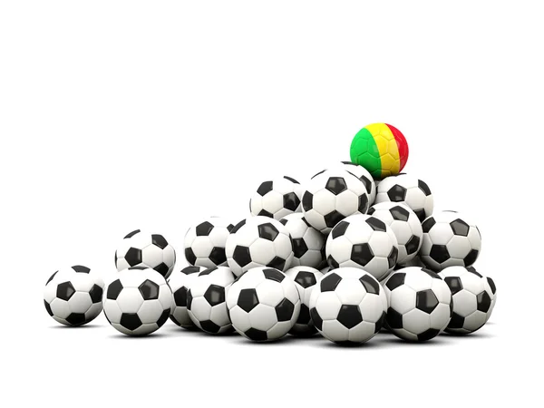 Montón de pelotas de fútbol con bandera de mali — Foto de Stock