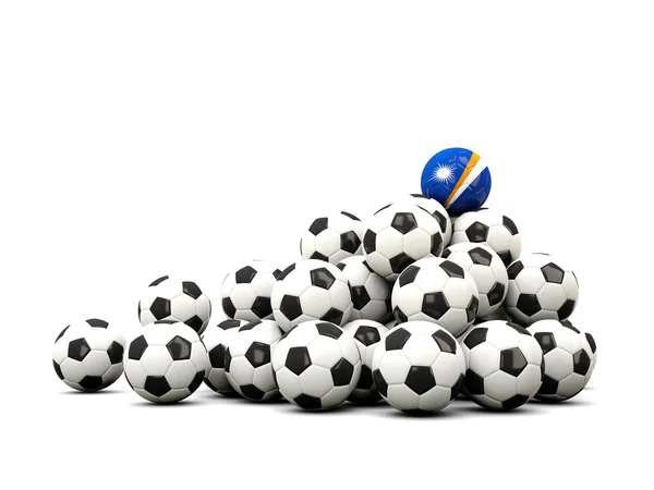 Högen av bollar fotboll med flagga Marshallöarna — Stockfoto