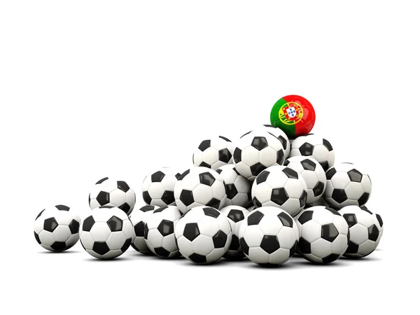 Pilha de bolas de futebol com bandeira de portugal — Fotografia de Stock