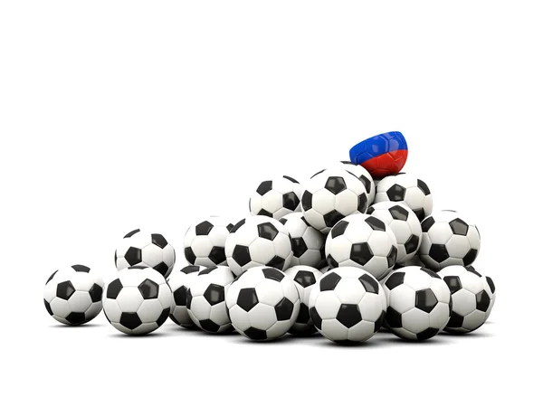 Σωρό από μπάλες ποδοσφαίρου με τη σημαία της Ρωσίας — Φωτογραφία Αρχείου