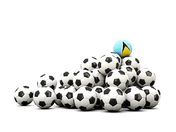 Pile de ballons de football avec drapeau de Sainte-Lucie — Photo