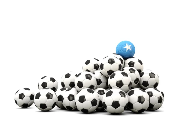 Futbol topu yığını Somali bayrağı ile — Stok fotoğraf