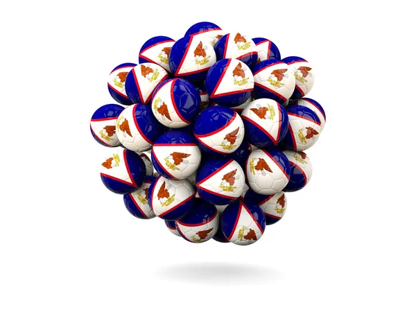 Pile of footballs with flag of american samoa — Stock Photo, Image