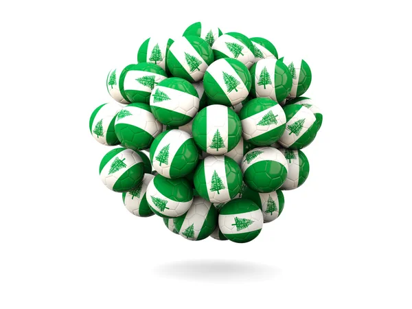 Pile of footballs with flag of norfolk island — Stock Photo, Image