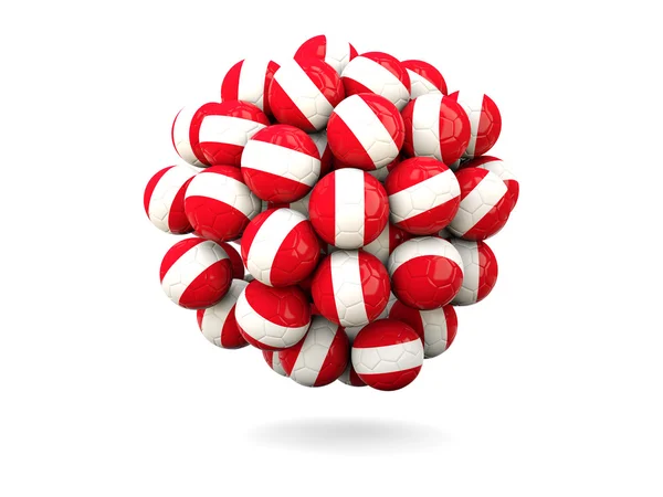 Pile of footballs with flag of peru — Stock Photo, Image