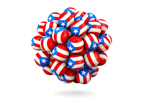 Куча футбольных мячей с флагом Пуэрто-Рико — стоковое фото