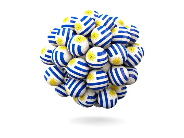 Pile of footballs with flag of uruguay — Stock Photo, Image