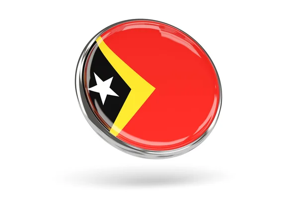 Bandera de Timor Oriental. Icono redondo con marco de metal — Foto de Stock