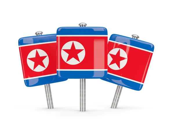 Kore Kuzey, üç kare pimleri bayrak — Stok fotoğraf