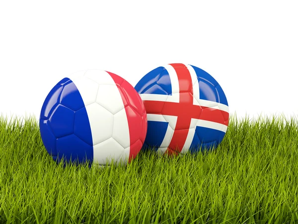 France and Iceland soccer  balls on grass — Stock Photo, Image