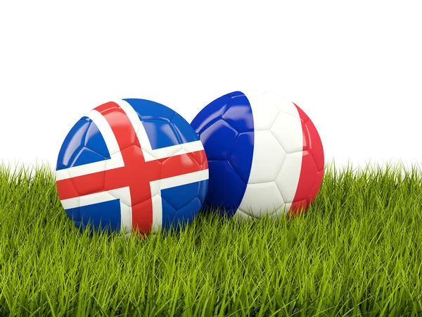 Francia e Islanda palloni da calcio su erba — Foto Stock
