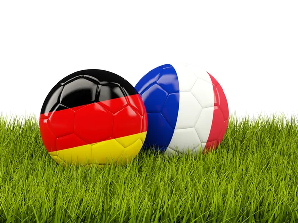 Francie a Německo fotbalové míče na trávě — Stock fotografie