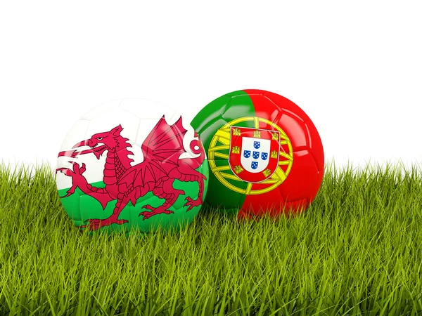 Wales a Portugalsko fotbalové míče na trávě — Stock fotografie