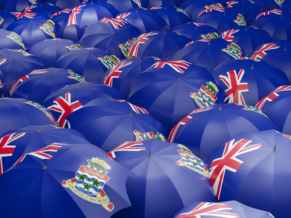 Umbrellas with flag of cayman islands — Stock Photo, Image