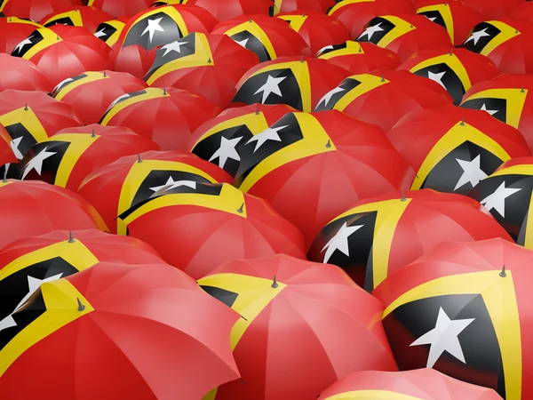 Paraplu's met de vlag van Oost-timor — Stockfoto