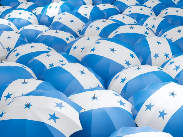 Guarda-chuvas com bandeira de honduras — Fotografia de Stock