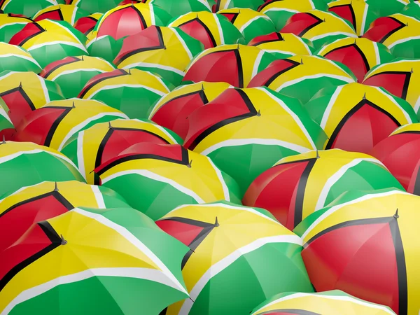 Esernyők, guyana zászlaja — Stock Fotó
