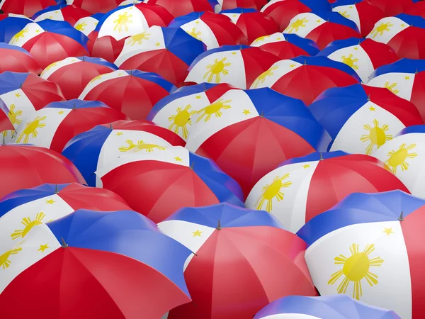 Зонты с флагом Филиппин — стоковое фото