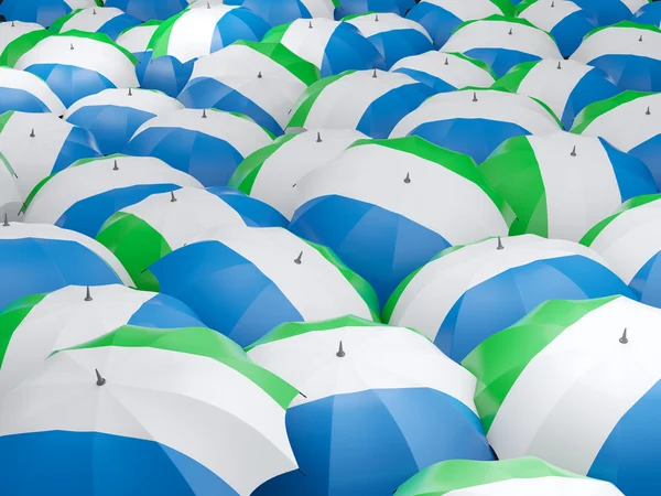 Esernyők, sierra leone zászlaja — Stock Fotó