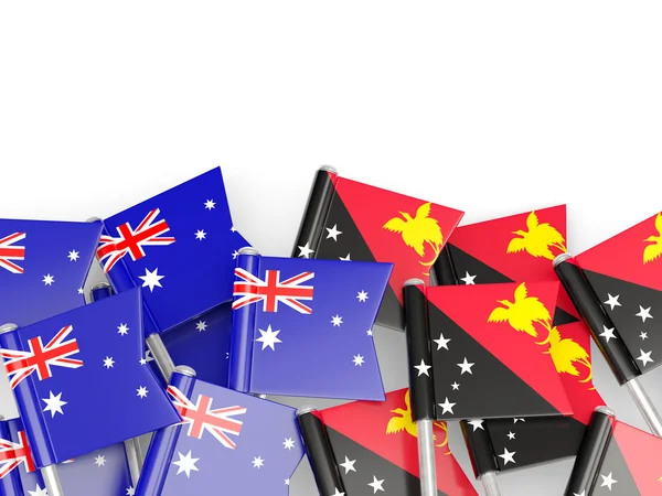 Drapeaux de l'Australie et de la Papouasie-Nouvelle-Guinée isolés sur blanc — Photo