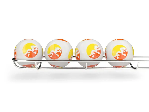 Flag of bhutan on lottery balls — Stock Photo, Image