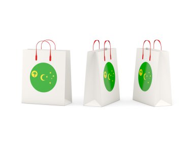 Cocos Adaları bayrağı üzerinde alışveriş torbaları