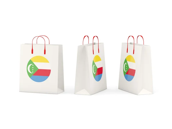 Bandera de comoras en bolsas de compras — Foto de Stock