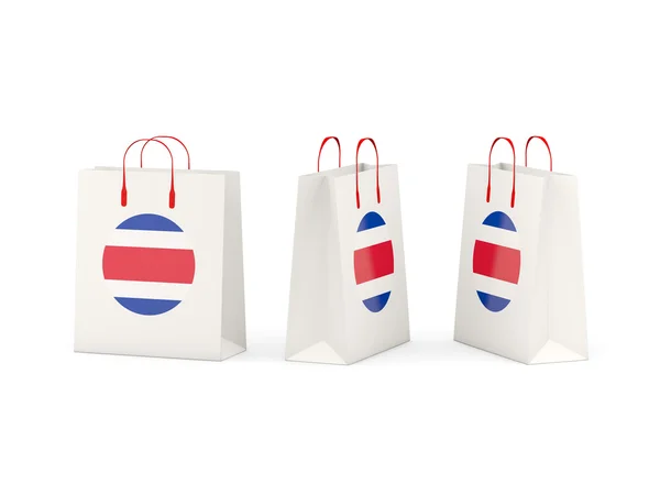 Vlag van costa rica op shopping tassen — Stockfoto