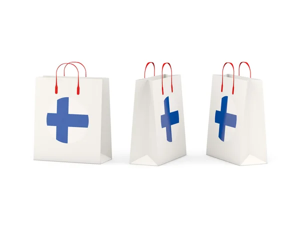 Bandeira da Finlândia em sacos de compras — Fotografia de Stock