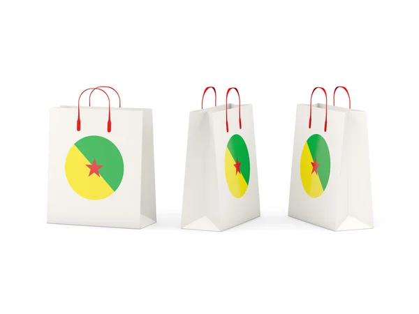 Vlag van Frans-Guyana op shopping tassen — Stockfoto