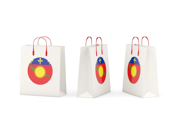 Vlag van guadeloupe op shopping tassen — Stockfoto