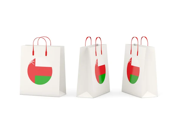買い物袋をオマーンの国旗 — ストック写真