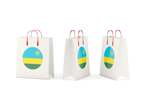 Vlag van rwanda op shopping tassen — Stockfoto