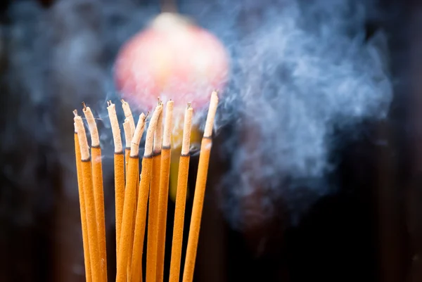 Close up of smoke from incense sticks