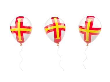 Hava balonları guernsey bayrağı ile