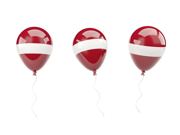 Air ballonger med under lettisk flagg — Stockfoto