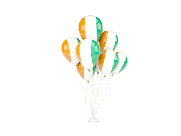 Fildişi Sahilleri bayrağı ile uçan balonlar — Stok fotoğraf