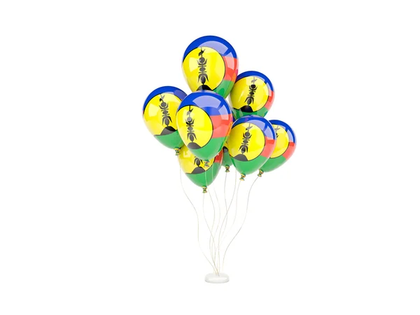 Летящие воздушные шары с флагом новой Каледонии — стоковое фото
