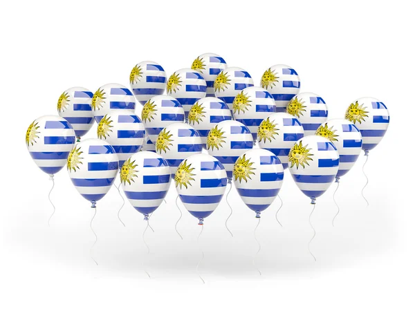 Léggömbök és uruguay zászlaja — Stock Fotó