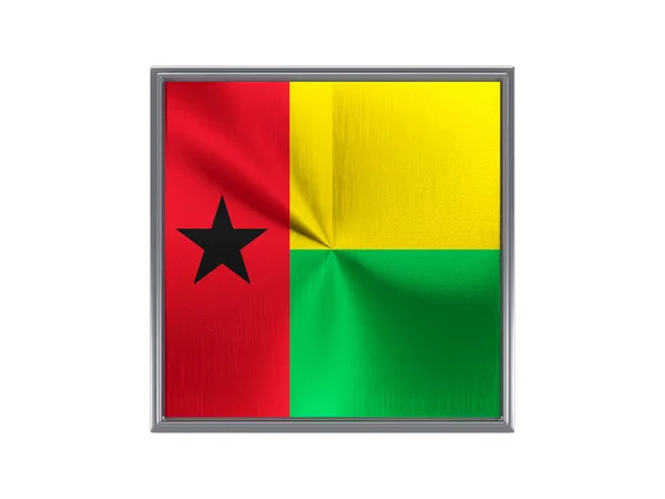 Kwadratowy metalowy przycisk z flaga Gwinei Bissau — Zdjęcie stockowe
